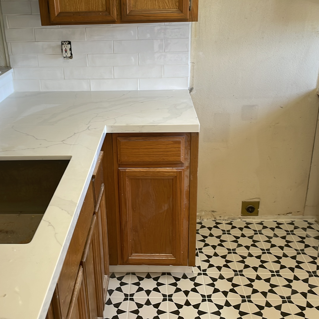 Kitchen upgrade with white subway tile backsplash and shaker-style cabinets
