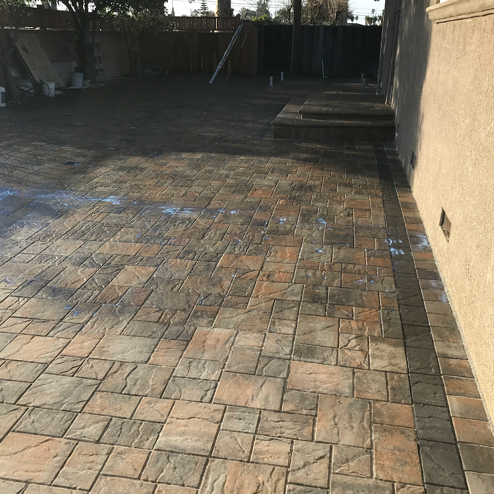 Stamped concrete patio with natural stone pattern and integrated border