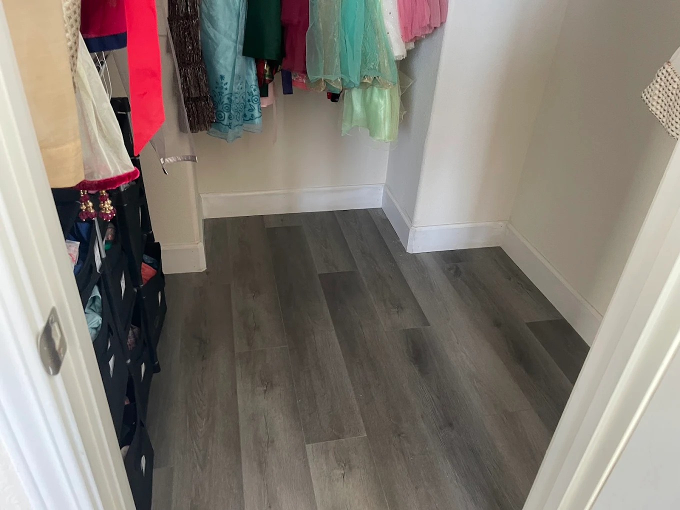 Luxury vinyl plank flooring installation in walk-in closet